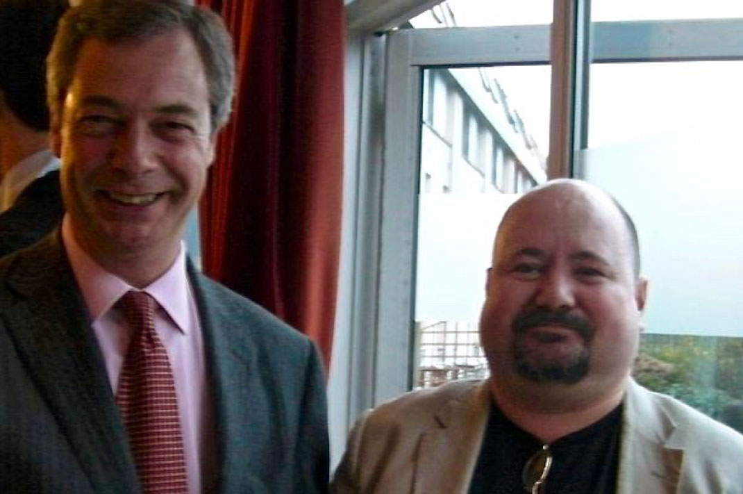 UKIP leader, Nigel Farage (L) with Andrew Lovie, neo-Nazi National Alliance member since 2000.
