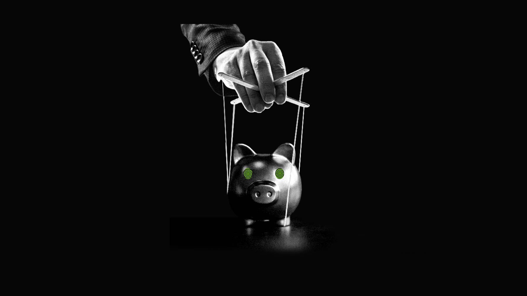 A hand uses a marionette control bar to manipulate a glossy piggy bank.