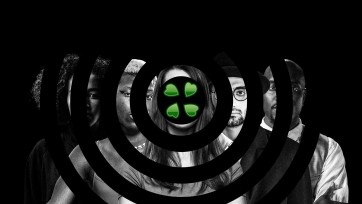 4chan logo inside a target circle covers individuals in the background.